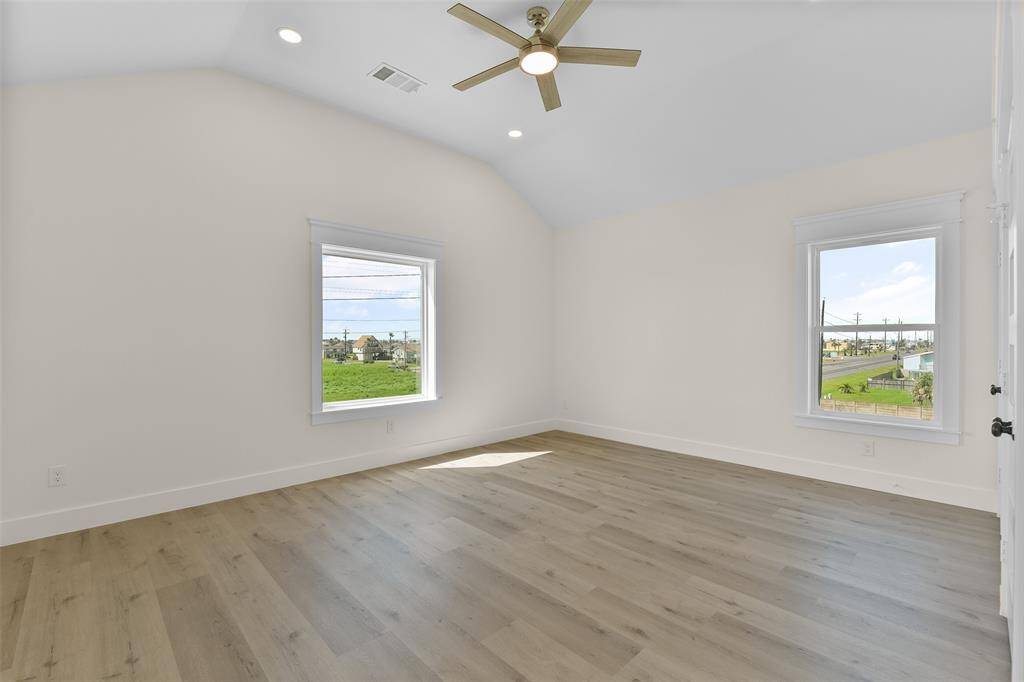 One of two primary suites is located on the third floor.