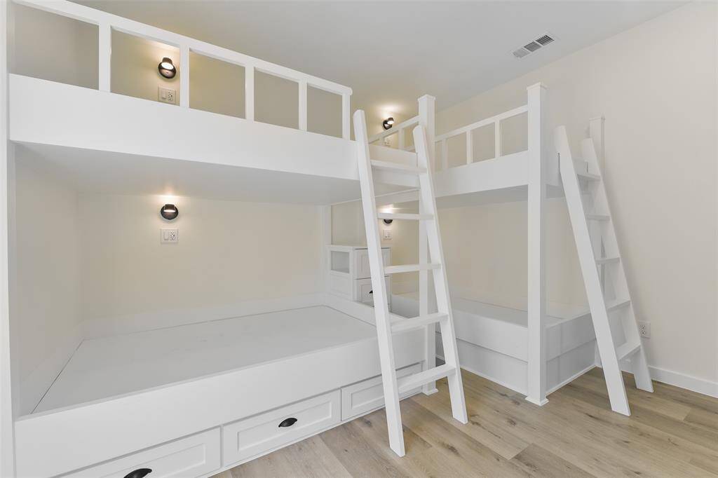 The custom-built bunks with storage.