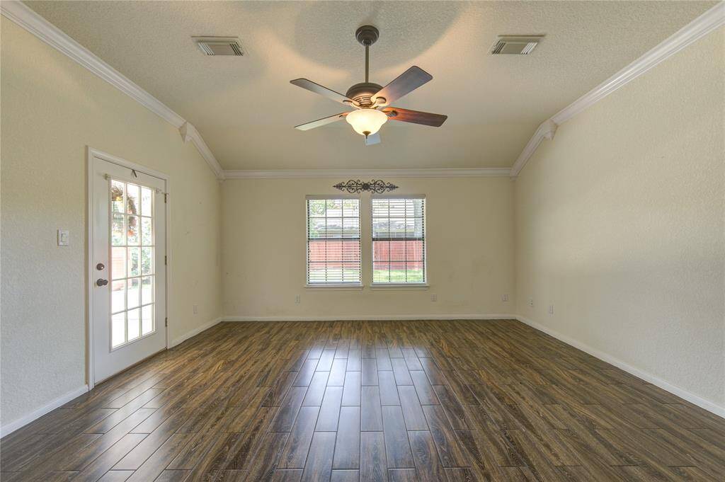 Primary bedroom with door to access covered patio