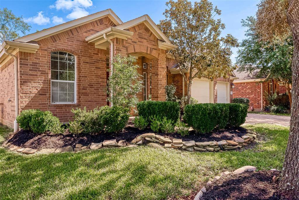 A long driveway welcomes you to this beautiful 1-story home.