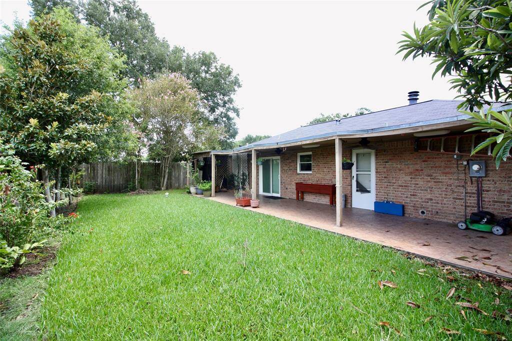 Backyard with large covered patio