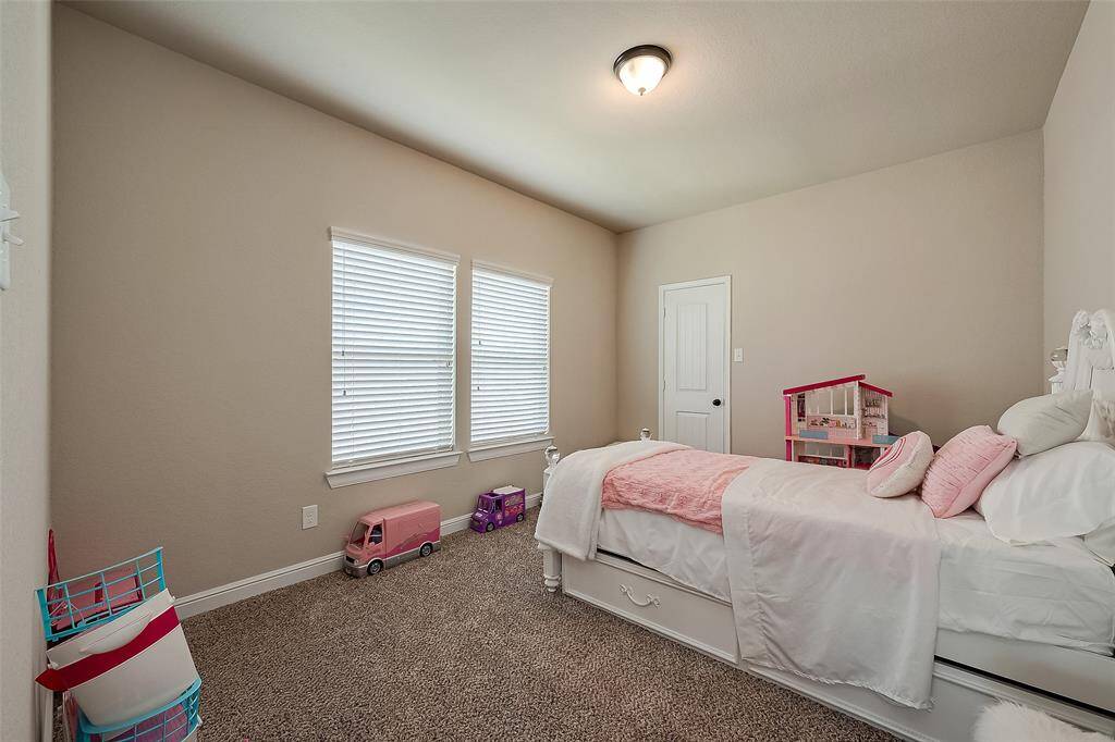 Third bedroom upstairs also has a walk-in closet.