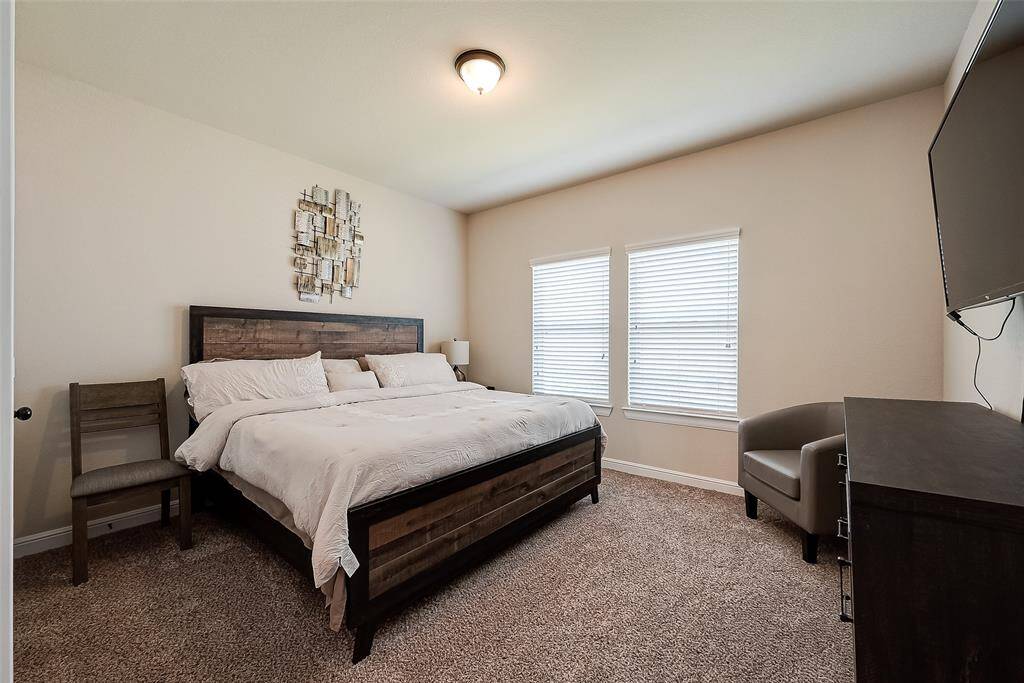 Perfect bedroom for the multi-generational family has an oversized walk-in closet and private full bathroom.