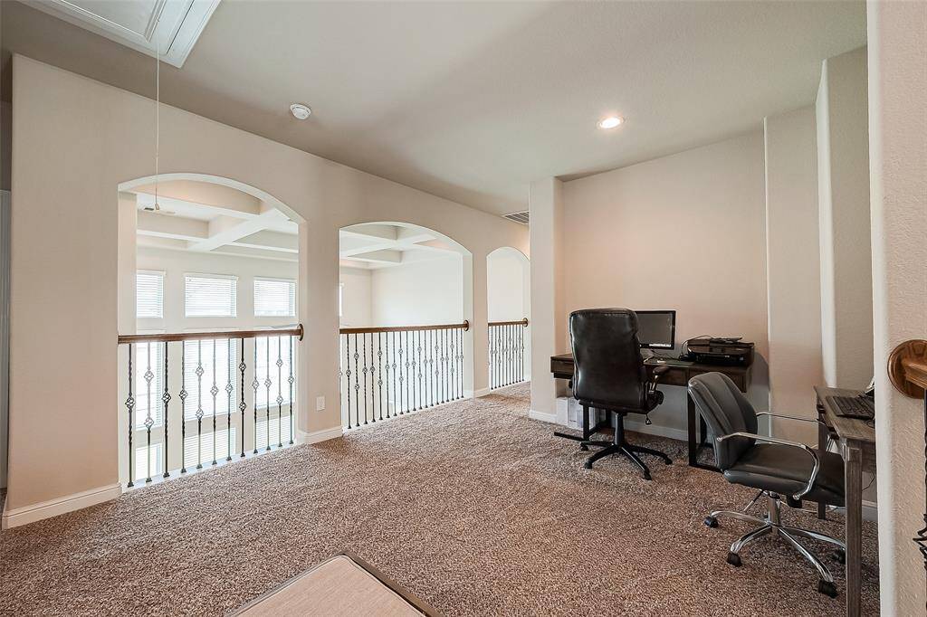 Upstairs office/ready loft adjacent to game  room.