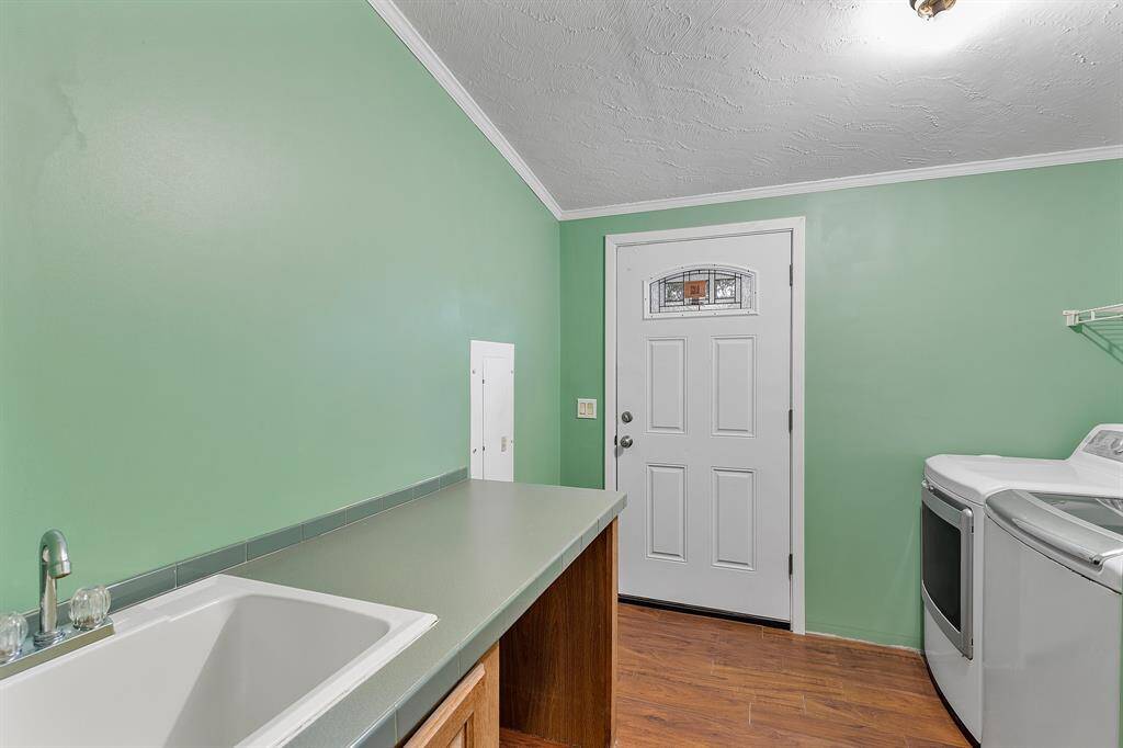 Laundry room comes with sink and folding table