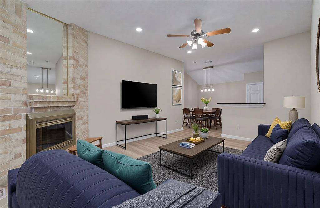 Discover the perfect blend of comfort and style in this inviting living space, featuring a cozy fireplace and modern finishes. Ideal for both relaxation and entertaining.