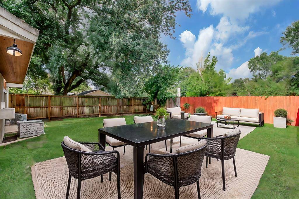 Create your perfect outdoor retreat in this spacious backyard, ideal for entertaining and relaxation.