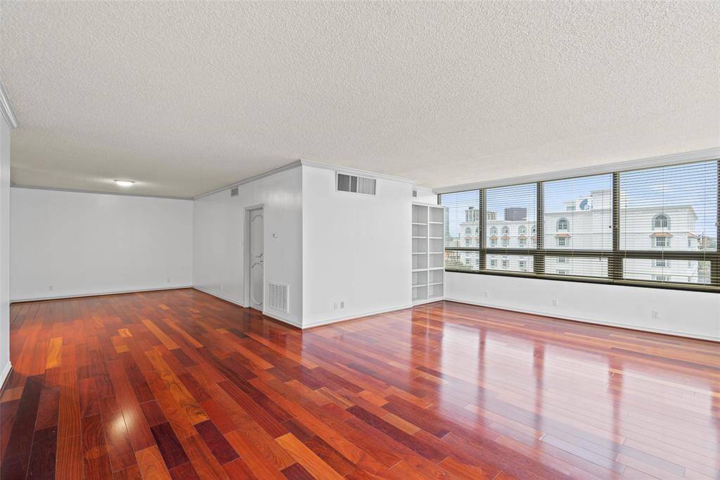 Fifth floor corner unit with lots of natural light and woodfloors.