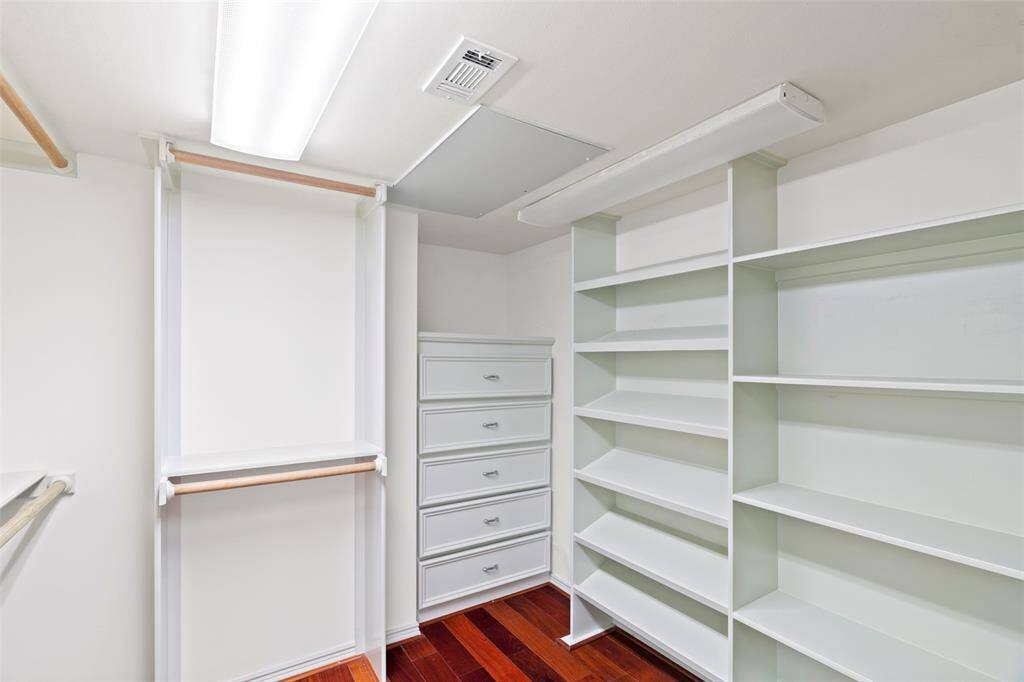 Primary walk-in closet.