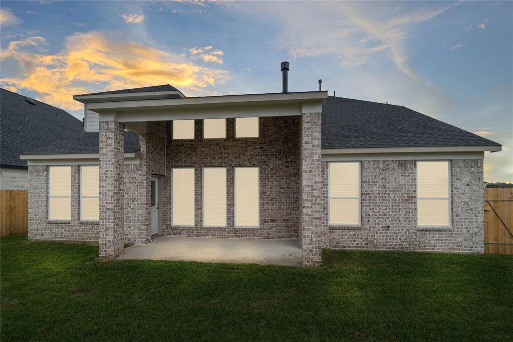 This backyard is enjoyable for everyone! From pets playing, kids jumping on the trampoline, or even having a garden, this amazing backyard and its covered patio provides space for endless activities for the whole family!