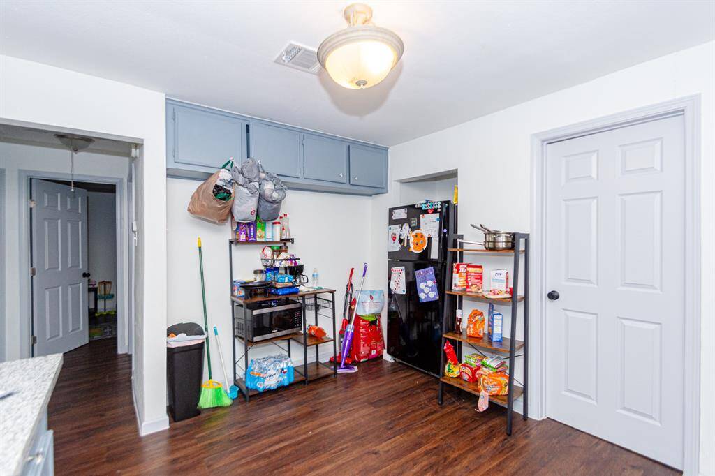 Functional kitchen with LVP through out the house
