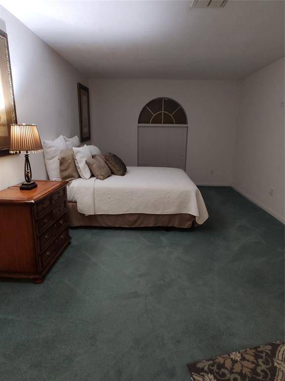 Another view of the primary bedroom.
