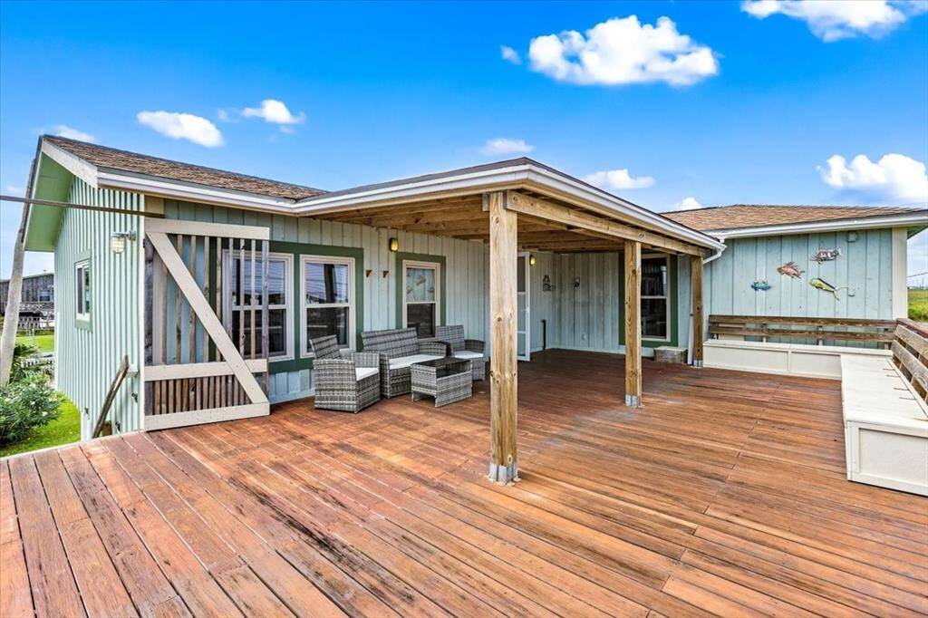 Welcome to 16507 John Davis Rd. Check out that large balcony, great for entertaining!
