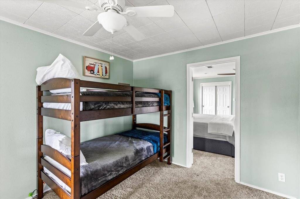 Flex space. Currently used for extra sleeping area. Also, has a desk and laundry room.