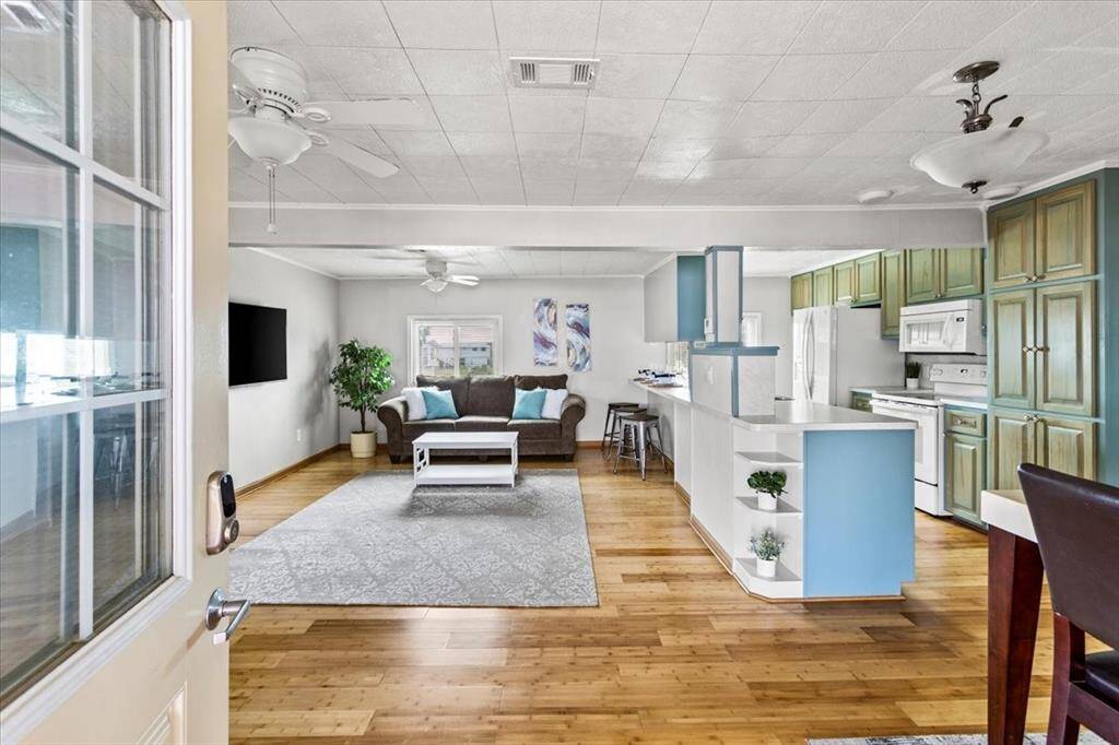 Entering into the home. Open Living, Dining and Kitchen