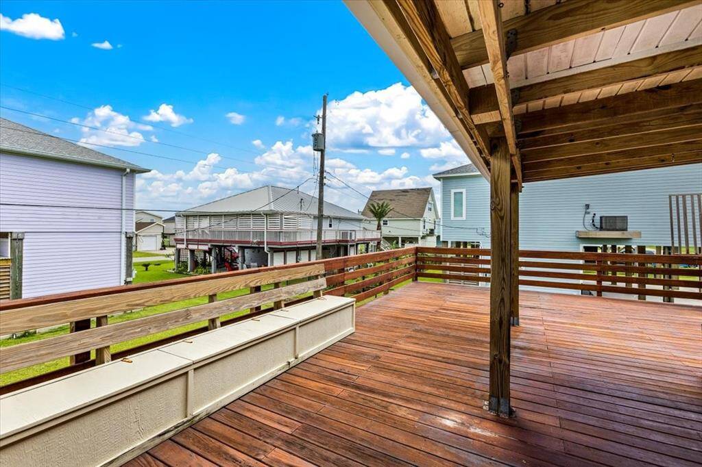 Large, partially covered balcony. Great for getting some sun or entertaining in the shade. Bench seating with extra storage!