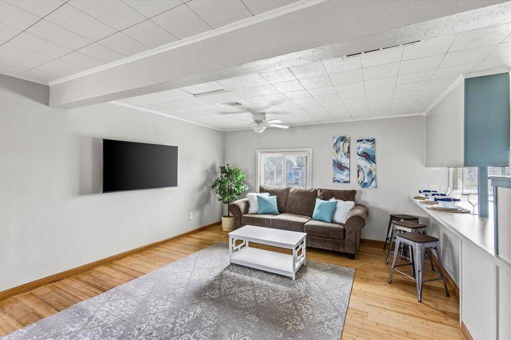 Large living room with eat in kitchen