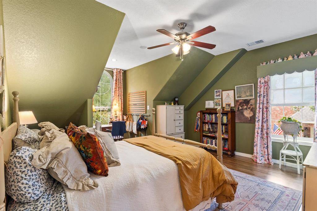 Fourth bedroom upstairs with attached bathroom.