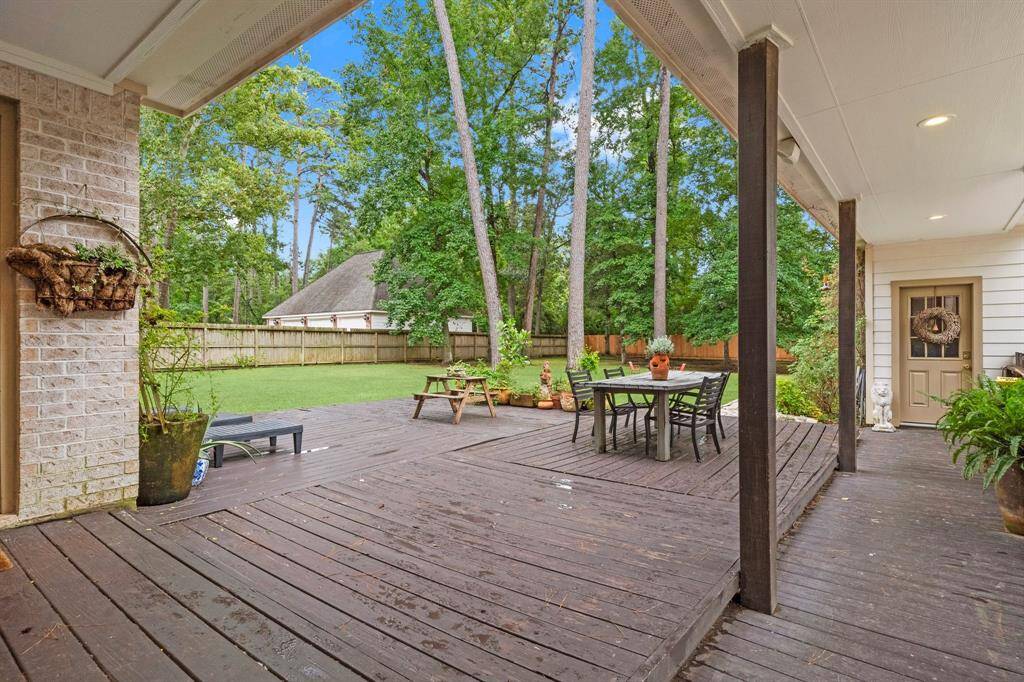 Large oversized backyard deck for lots of entertaining.