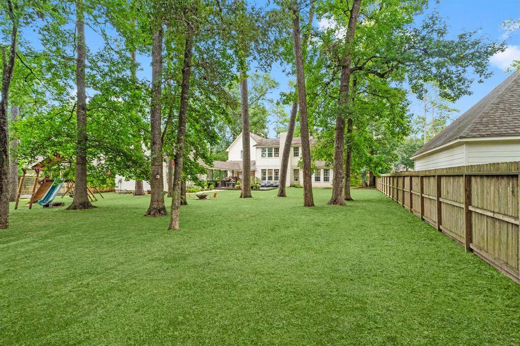 Beautiful trees around the lot.