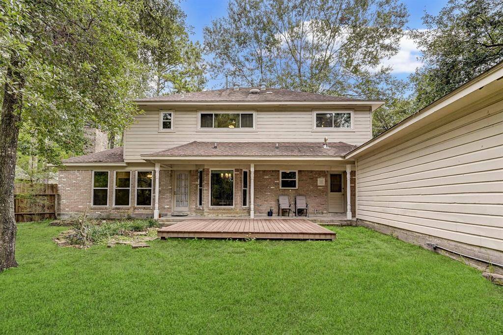 Large backyard with deck area