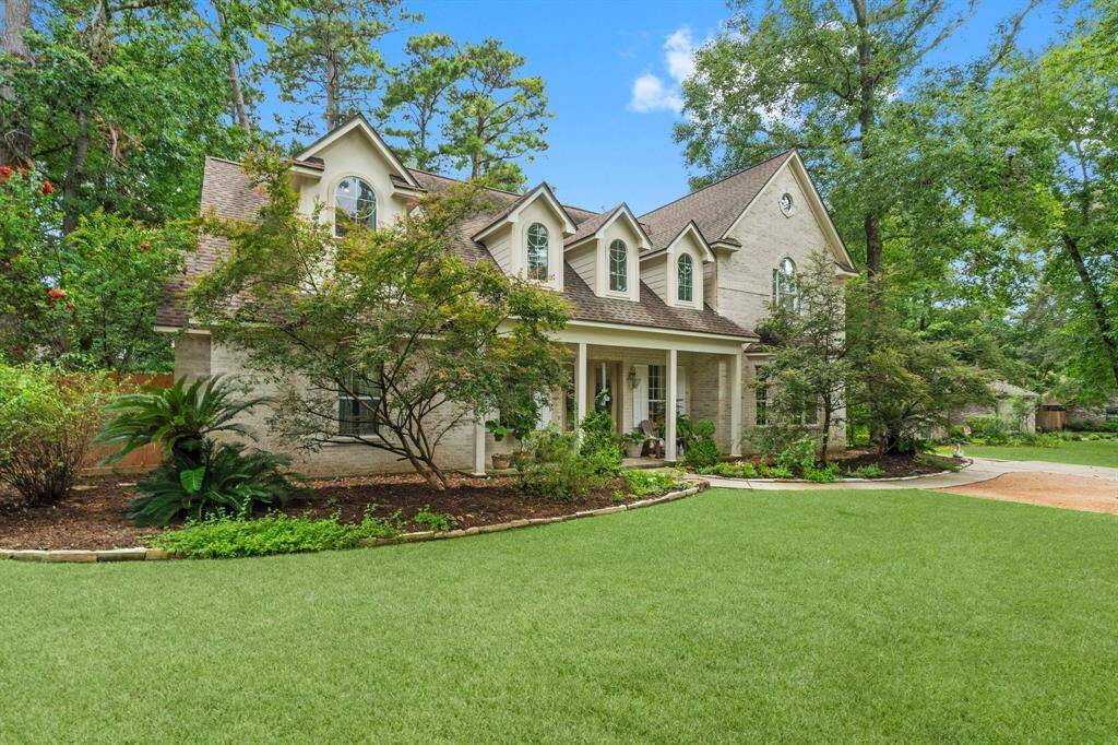 Lush landscaping around the entire front of property.