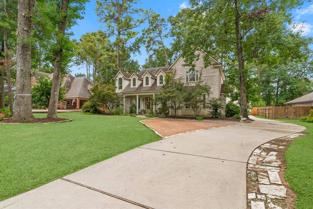 Extended long driveway to the detached/attached garage. Extra parking at the front of the home.