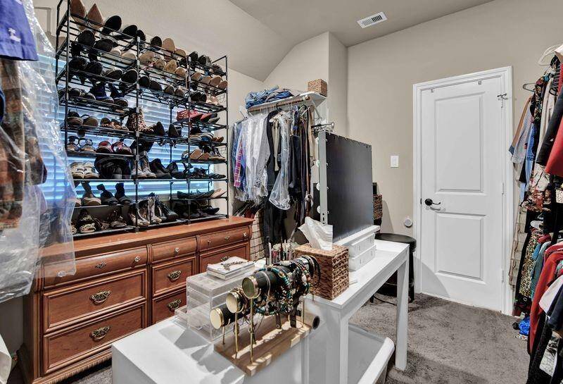 Extra large walk in primary closet