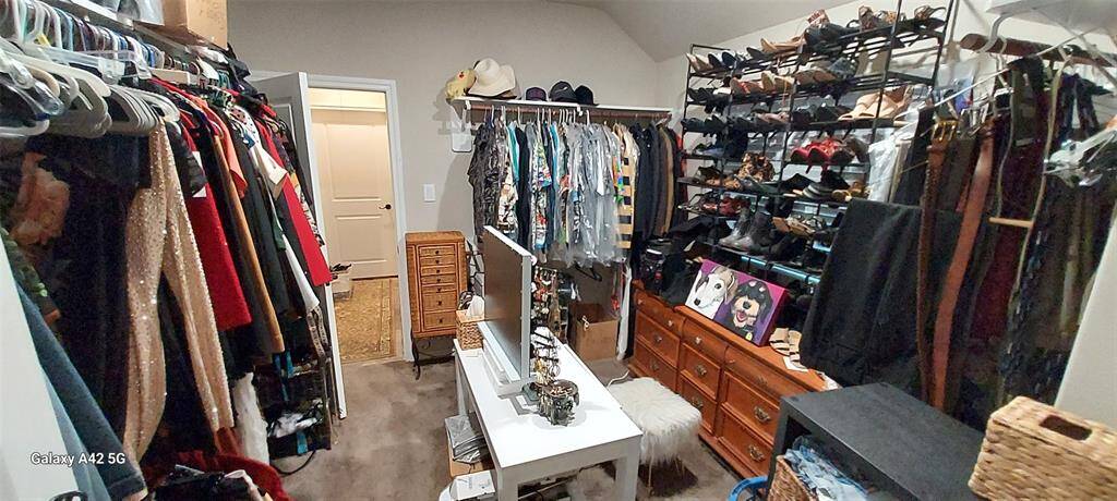 Extra large walk in primary closet