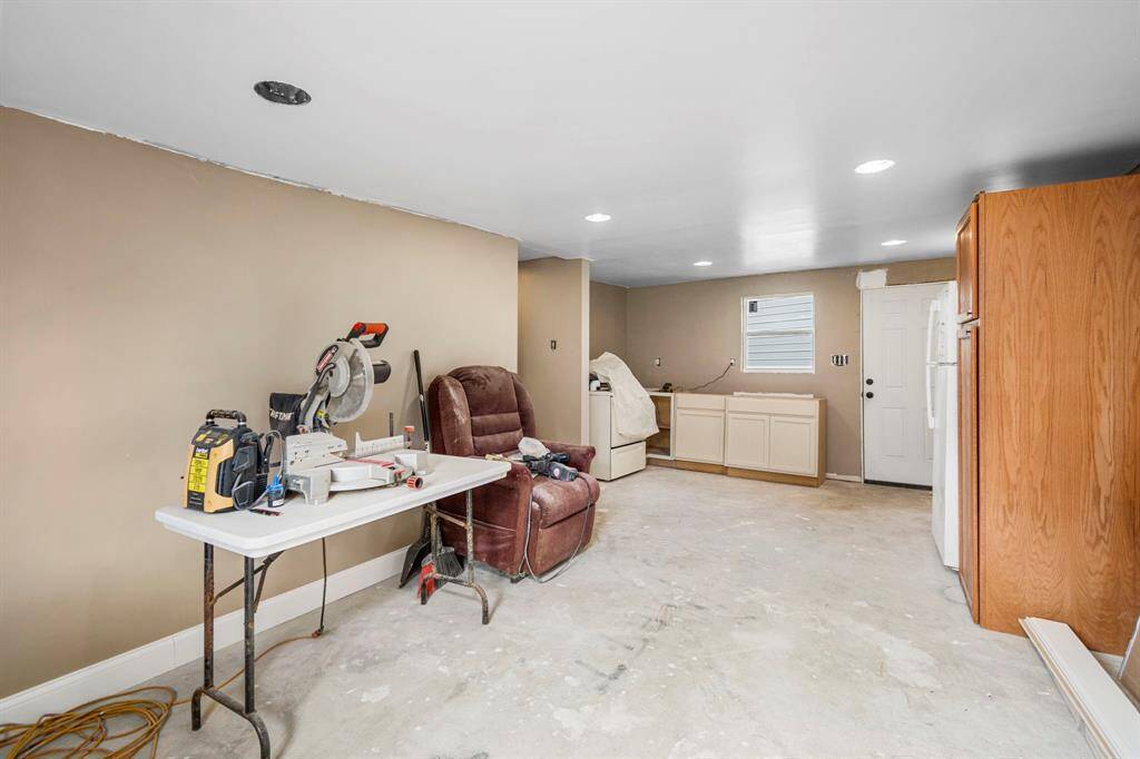 partially completed 1-bedroom, 1-bathroom apartment attached, providing extra living space or the potential for rental income
