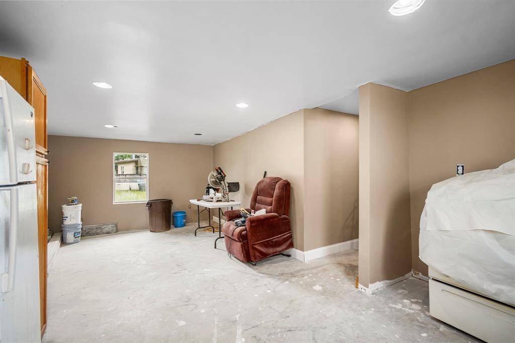 partially completed 1-bedroom, 1-bathroom apartment attached, providing extra living space or the potential for rental income
