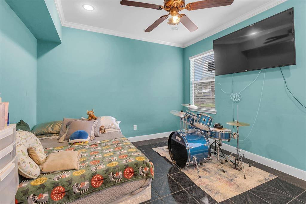 Spacious, ground-level bedroom with contemporary amenities and stylish finishes.