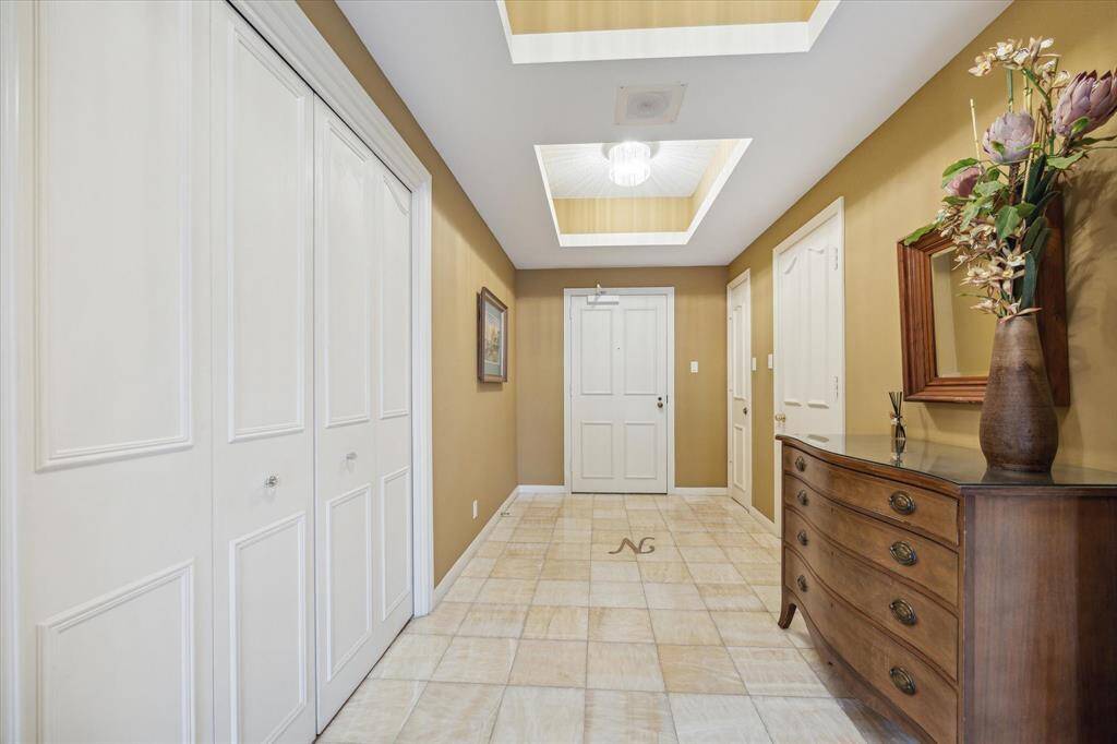 Spacious 7x18 foyer with convenient storage closets on both sides.