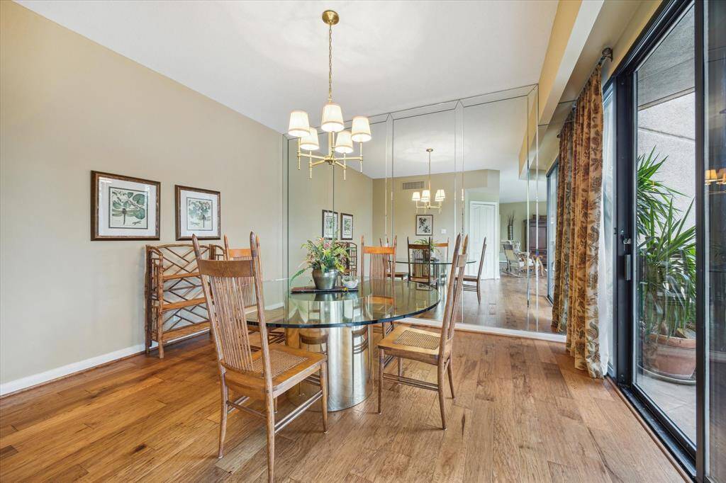 This inviting 12x13 dining room opens directly to the balcony, perfect for seamless entertaining.