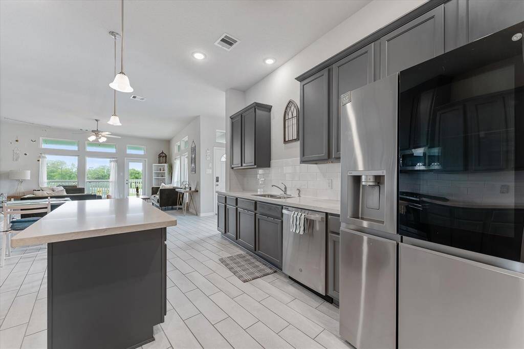 Enjoy views to the balcony, adding a touch of openness and natural light to the space.
