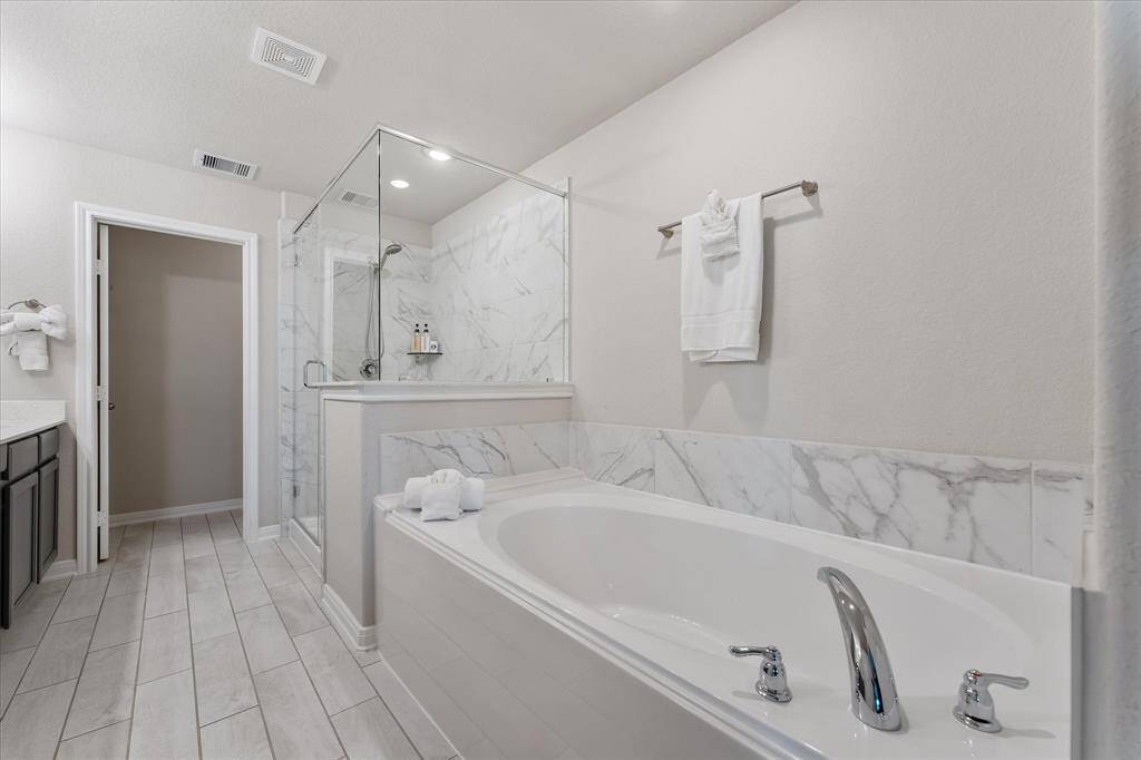Unwind in the elegant soaking tub