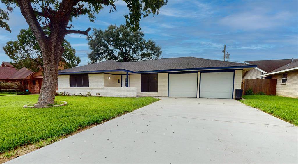 A spacious NEW concrete driveway, all set in a residential neighborhood.
