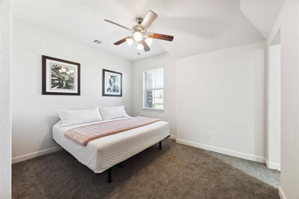 Upstairs Bedroom with Ceiling Fan.