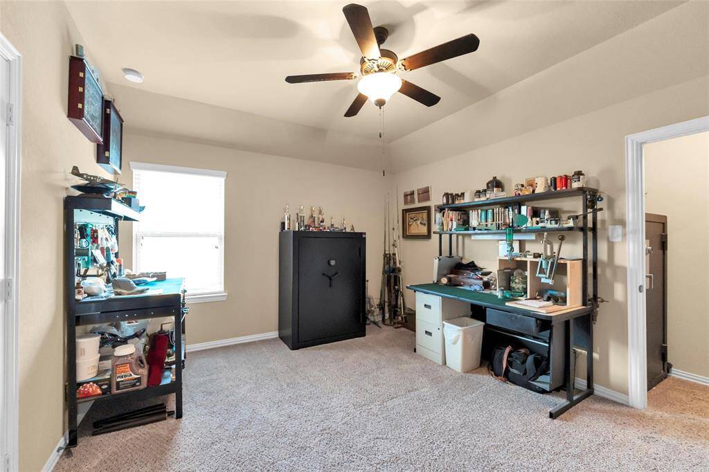 Secondary Bedroom #2 being used as his (hobby room)