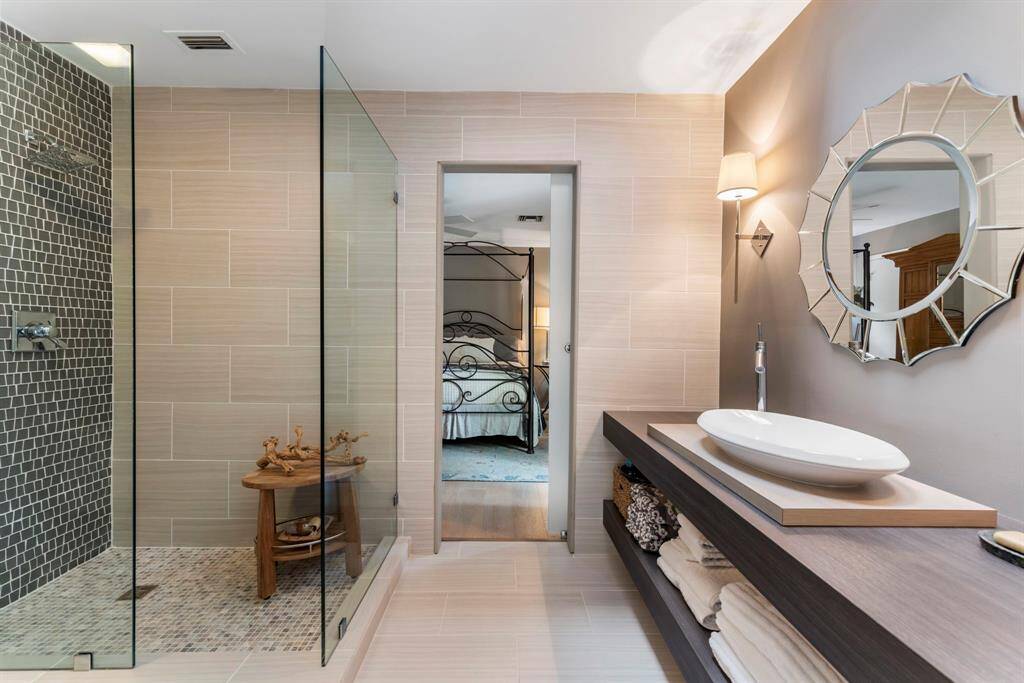 Offering every comfort and amenity, this spa like bath is sure to please.