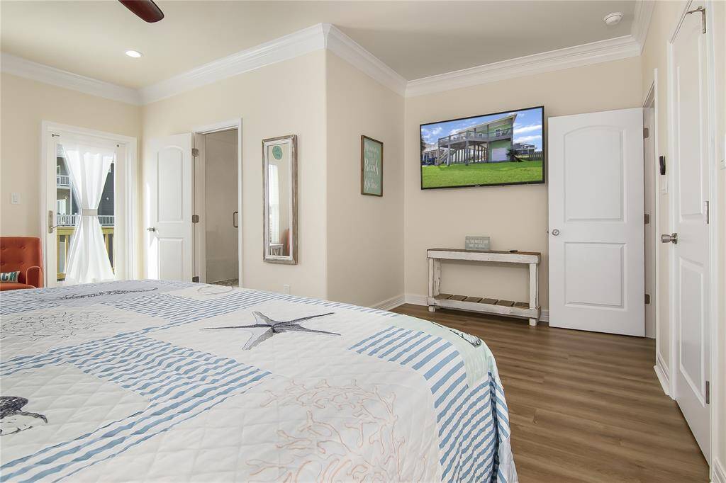 Oversized primary bedroom with additional sitting area.