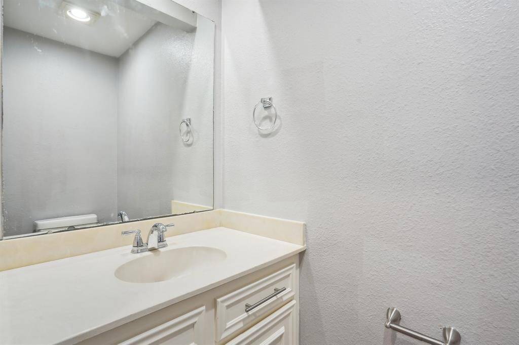 Half bath on the same level as living room and kitchen
