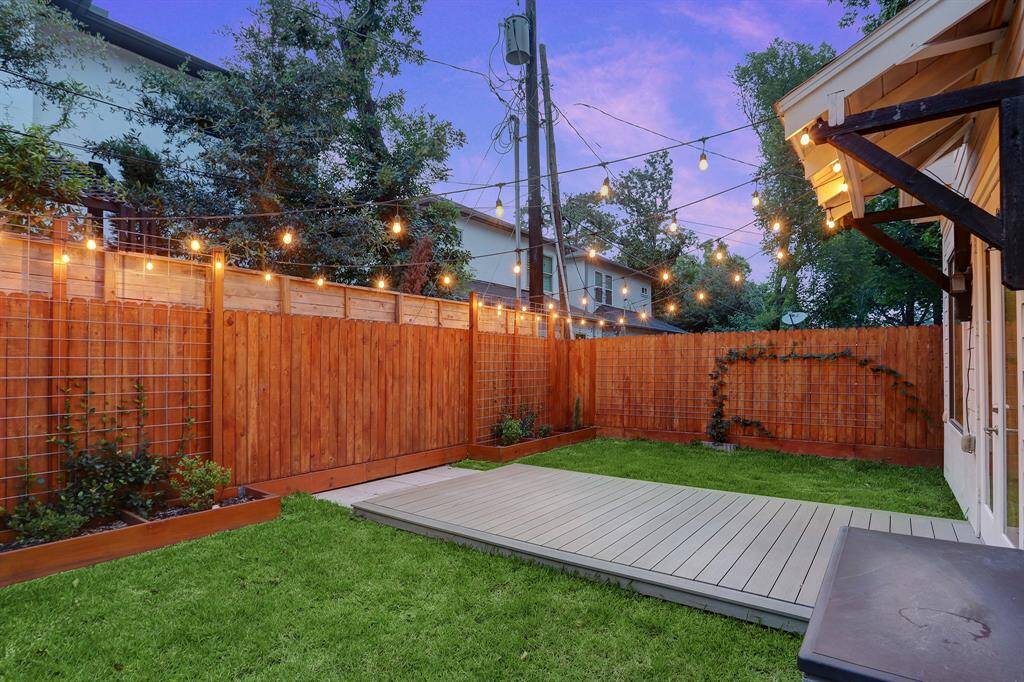 Another View of Backyard with Custom Deck.