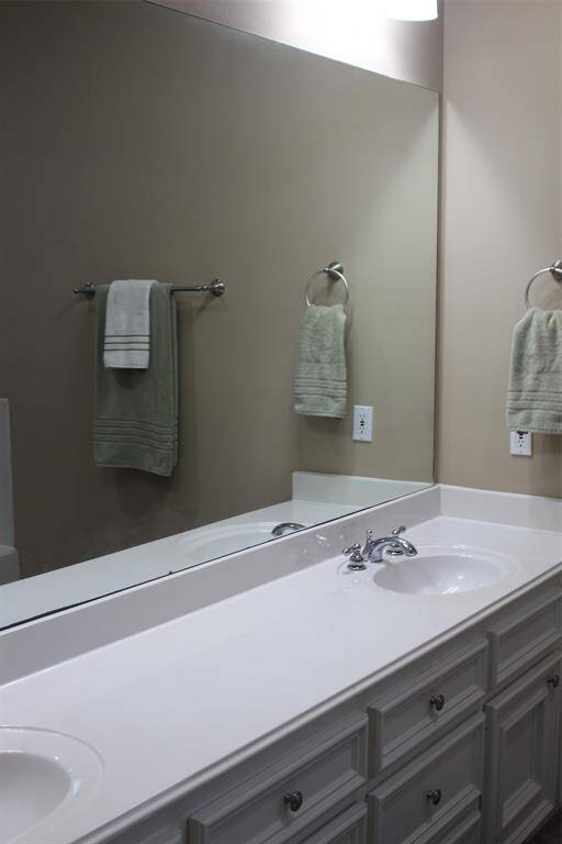 Primary Bath has large vanity with Double Sinks.