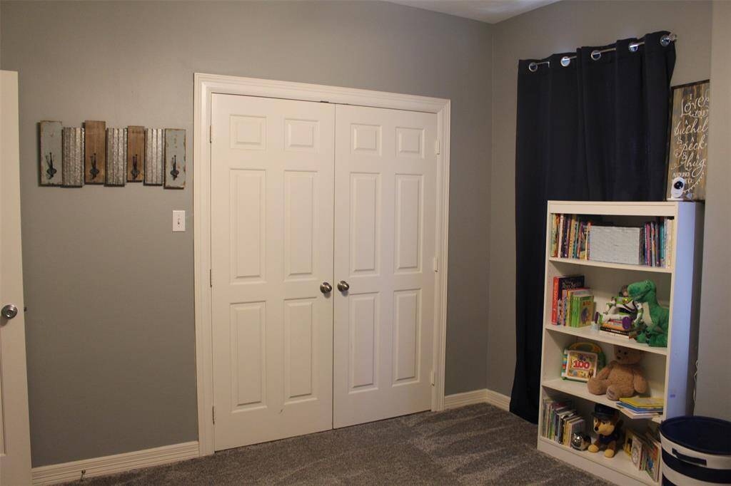 Bedroom 1 double closet doors.