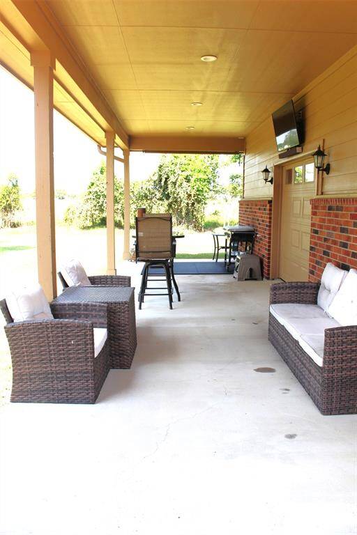 Covered Patio Area off additional garage.