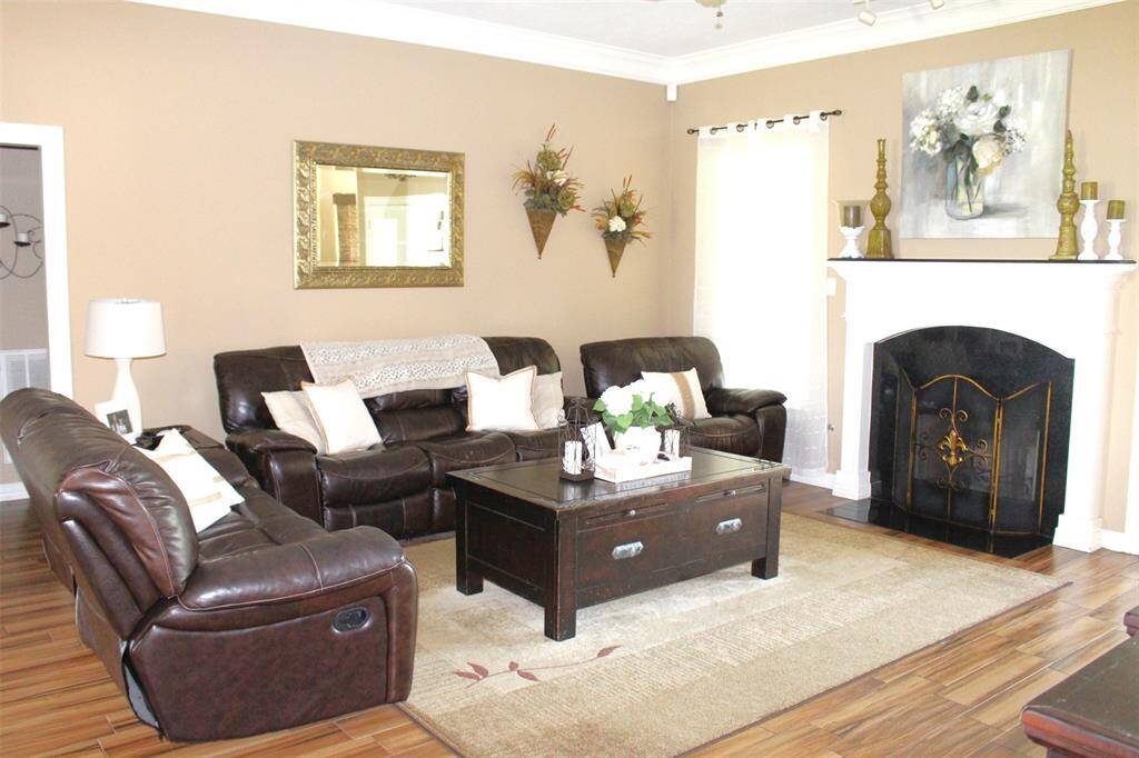 Cozy up to this wood burning fireplace.