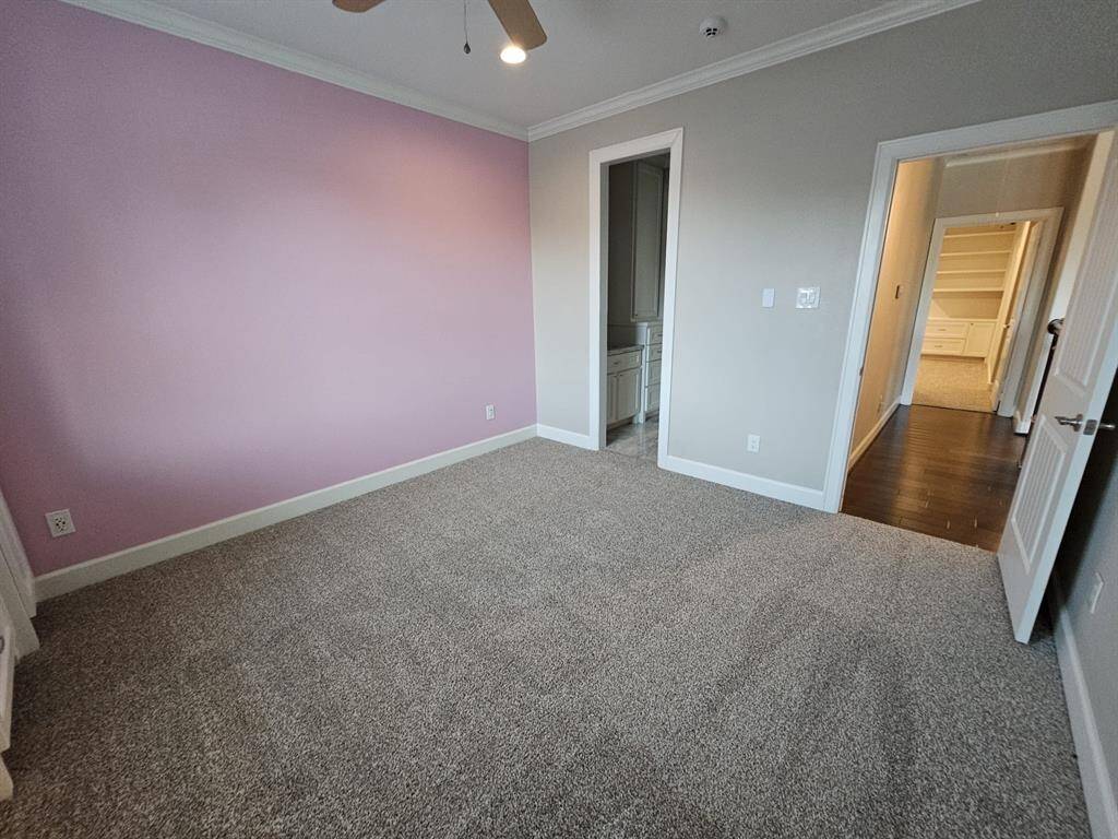 upstairs bedroom. Closet and personal sink.