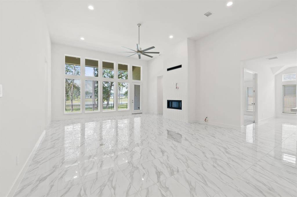 wall of windows, 2 story ceiling