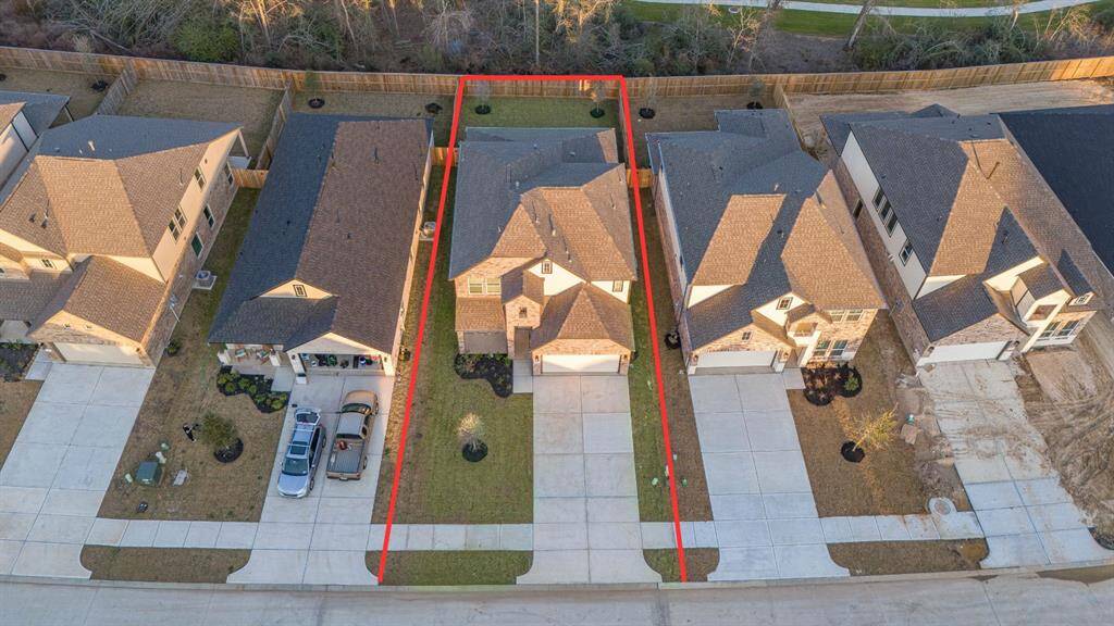This home sits on a large lot with ample space in front and the back, lush landscaping and a well-maintained yard.